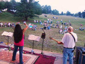 Looking out into the field at Laurel Lakes where the audience numbers grew steadily all evening long